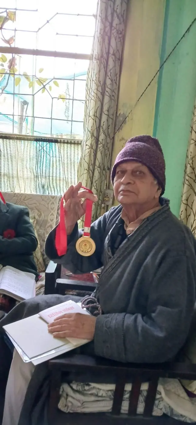 Senior author honoured for his poetry collection